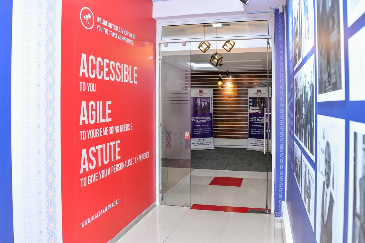 Alakonya Law office entrance and branded corridor